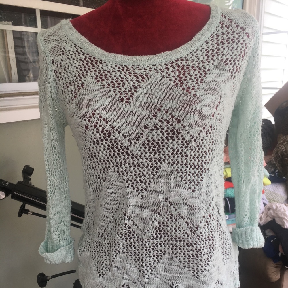 Light sweater size Medium
